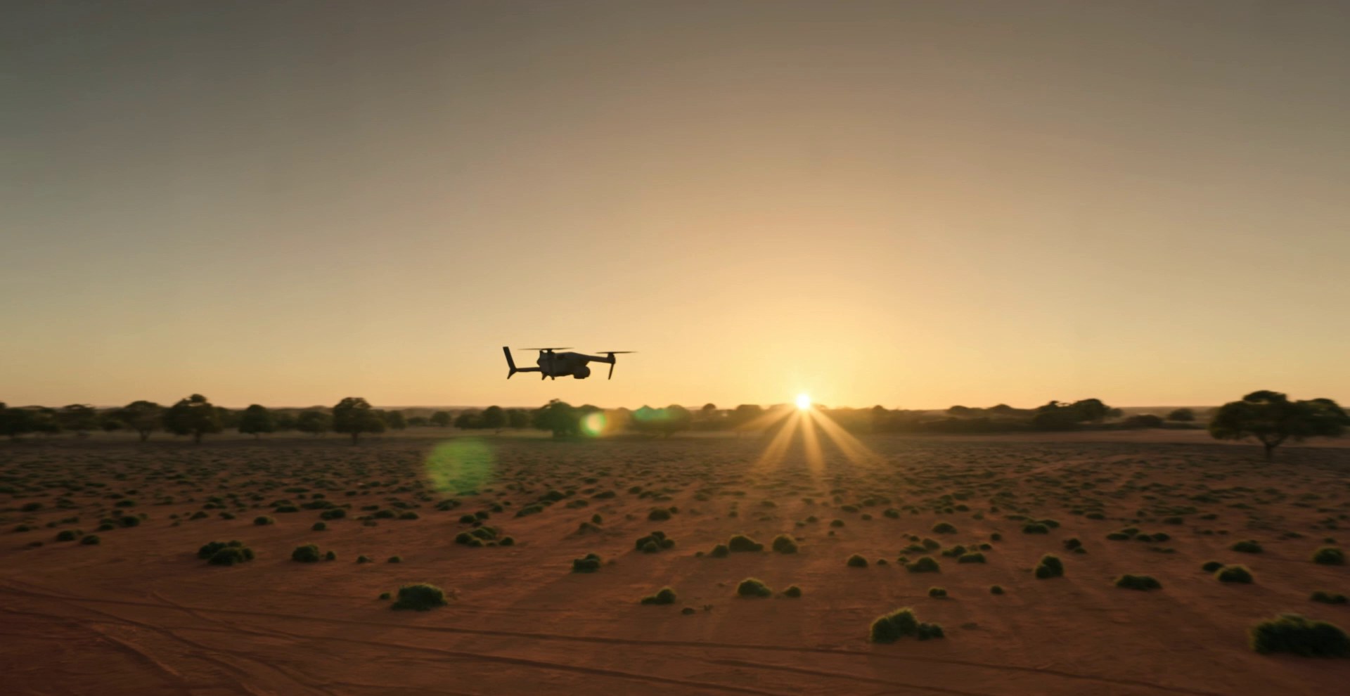 Autonomous drone on station over the outback at golden hour